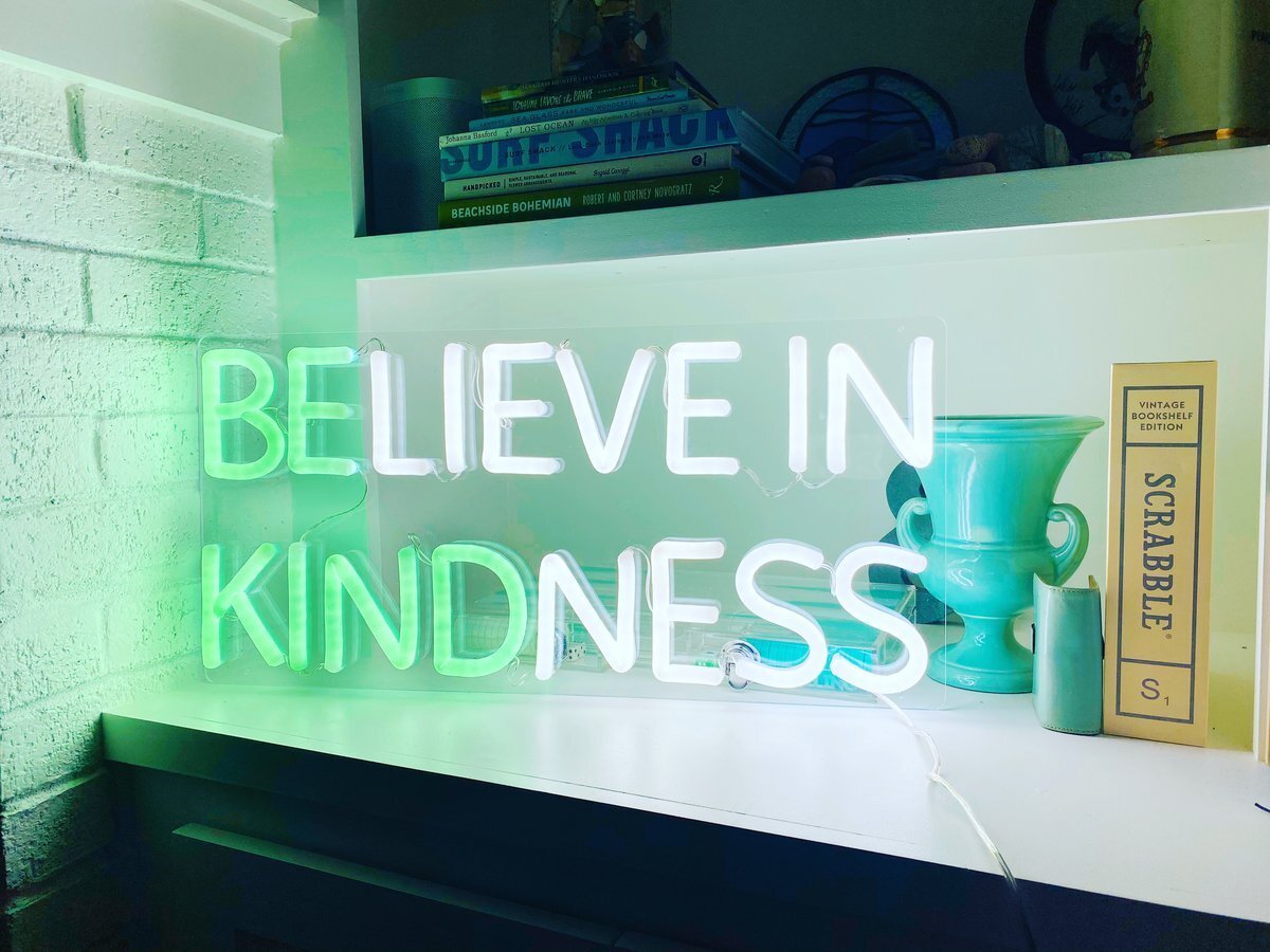 ocean teal and brite white neon sign