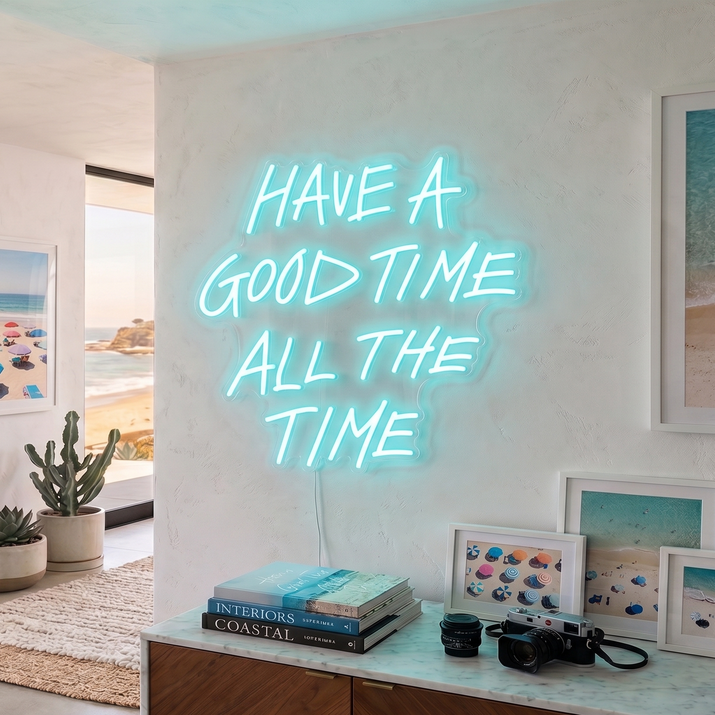 Neon sign in a room with beach-themed decor and framed pictures.